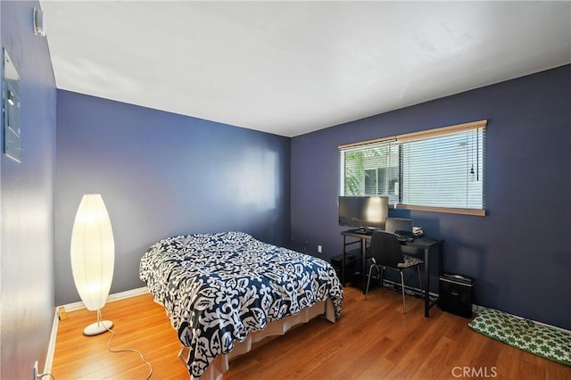 6250 Fulton Ave Unit 104, Van Nuys, CA 91401 - bedroom with wood finished floors