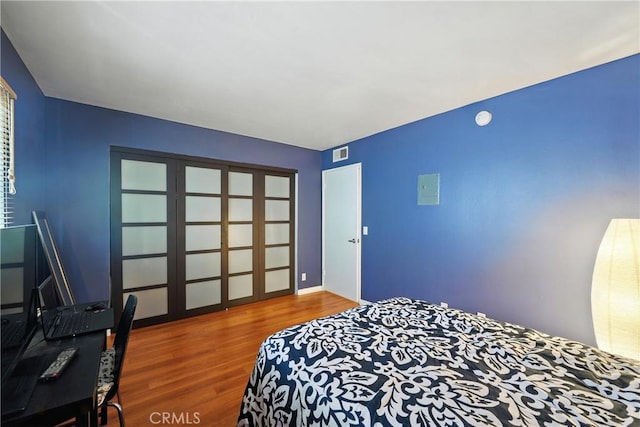 6250 Fulton Ave Unit 104, Van Nuys, CA 91401 - bedroom featuring wood finished floors