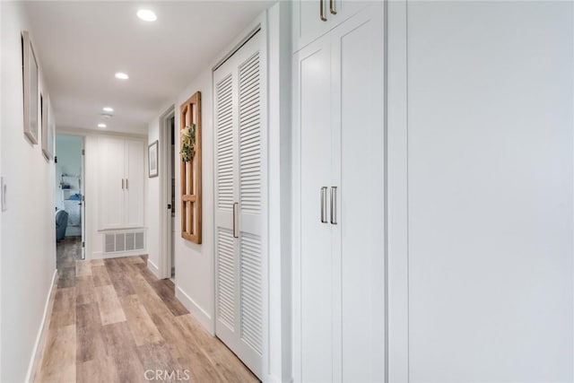 2501 S El Camino Real Unit 310, San Clemente, CA 92672 - hall with recessed lighting and light wood-style flooring