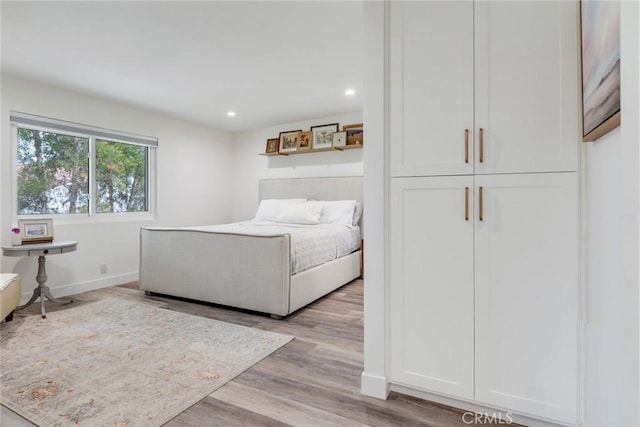 2501 S El Camino Real Unit 310, San Clemente, CA 92672 - bedroom featuring recessed lighting and light wood-type flooring