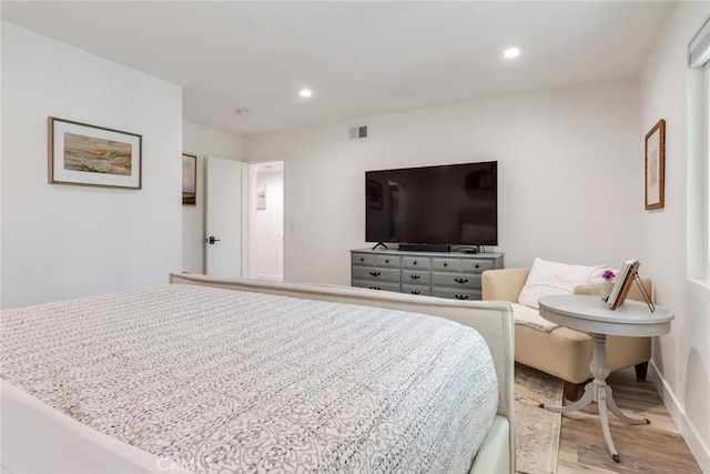 2501 S El Camino Real Unit 310, San Clemente, CA 92672 - bedroom with light wood-type flooring and recessed lighting