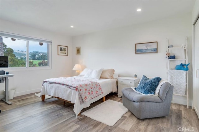2501 S El Camino Real Unit 310, San Clemente, CA 92672 - bedroom with light wood-type flooring and recessed lighting
