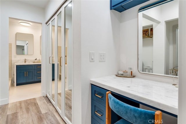 2501 S El Camino Real Unit 310, San Clemente, CA 92672 - full bathroom with wood finished floors and vanity