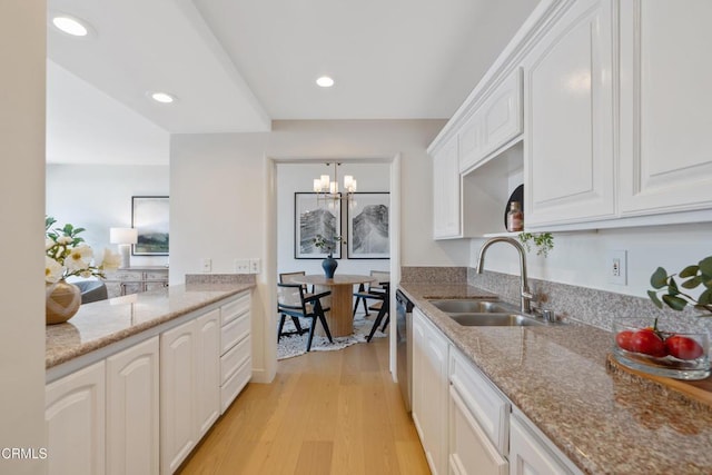 960 San Pasqual St Unit 208, Pasadena, CA 91106 - kitchen featuring a chandelier, light wood-type flooring, white cabinetry, light stone countertops, and recessed lighting