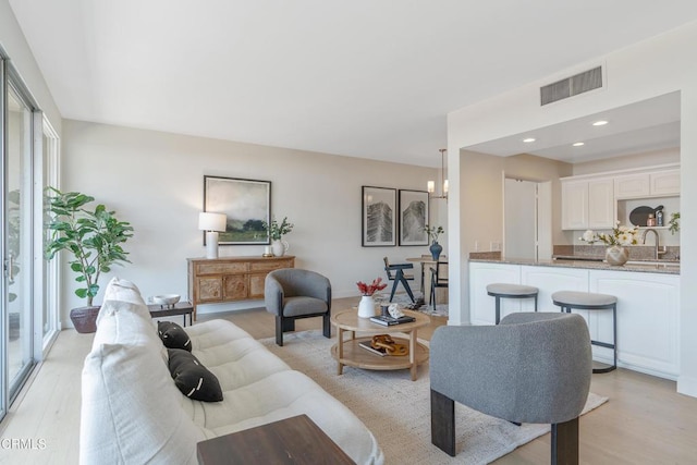 960 San Pasqual St Unit 208, Pasadena, CA 91106 - living room featuring light wood finished floors
