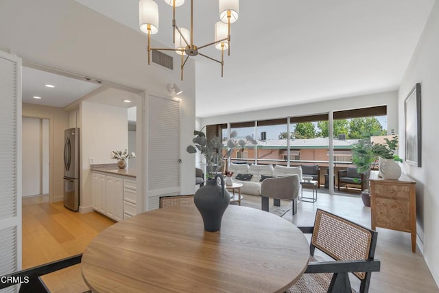960 San Pasqual St Unit 208, Pasadena, CA 91106 - dining room featuring light wood-style floors, a chandelier, and recessed lighting