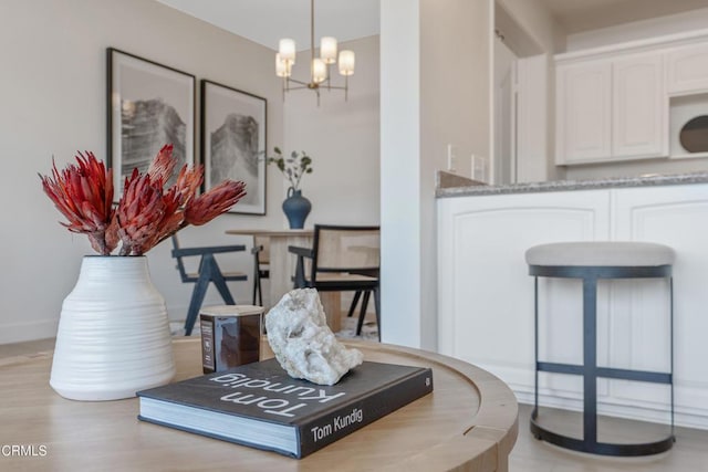 960 San Pasqual St Unit 208, Pasadena, CA 91106 - detailed view of a chandelier and baseboards