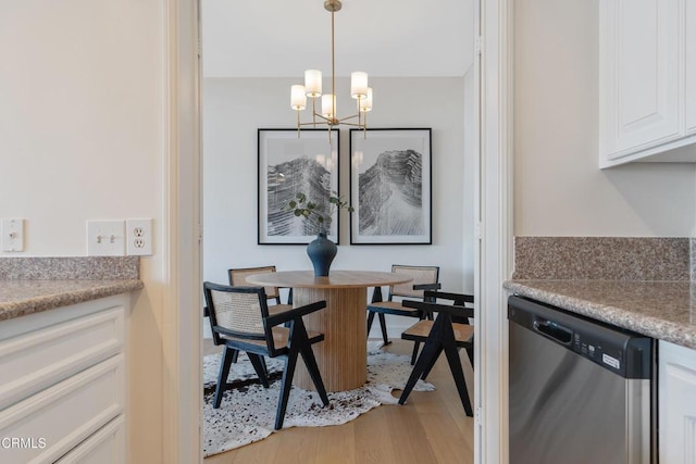 960 San Pasqual St Unit 208, Pasadena, CA 91106 - dining area with a chandelier and light wood finished floors