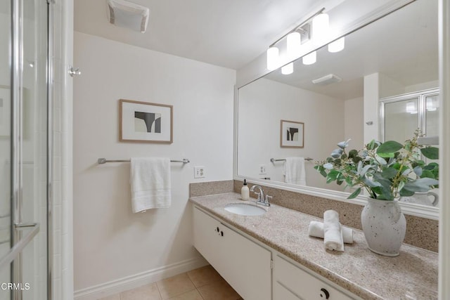 960 San Pasqual St Unit 208, Pasadena, CA 91106 - bathroom with vanity, tile patterned floors, and an enclosed shower
