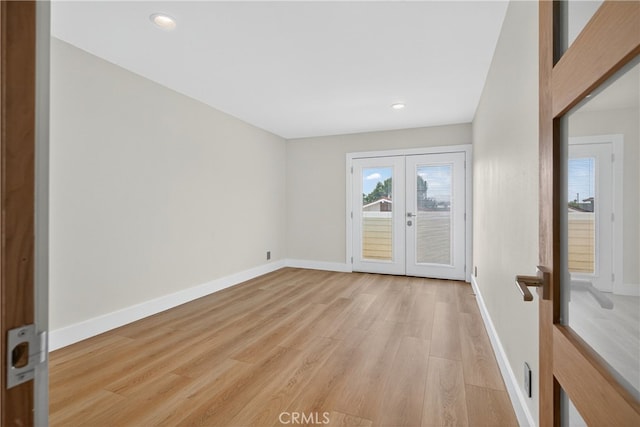 913 Lindencliff St, Torrance, CA 90502 - empty room featuring light wood-style flooring, french doors, and recessed lighting
