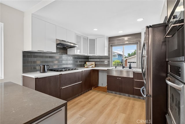 913 Lindencliff St, Torrance, CA 90502 - kitchen featuring stainless steel appliances, under cabinet range hood, white cabinets, modern cabinets, and recessed lighting