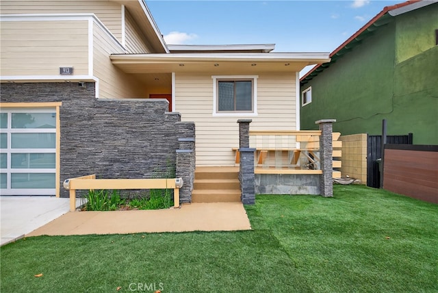 913 Lindencliff St, Torrance, CA 90502 - back of property with stone siding and a garage