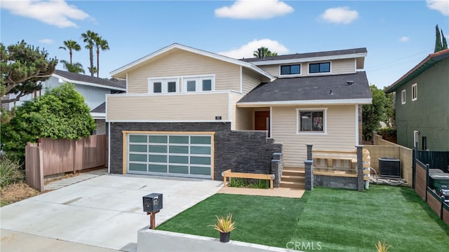 913 Lindencliff St, Torrance, CA 90502 - view of front of home featuring driveway, a garage, and stone siding