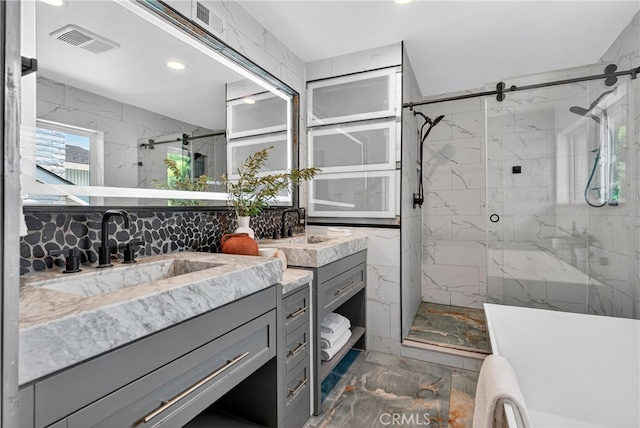 913 Lindencliff St, Torrance, CA 90502 - bathroom featuring marble look tile flooring, vanity, a marble finish shower, and recessed lighting