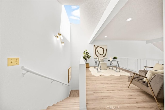 45 Briarglen Unit 64, Irvine, CA 92614 - stairway with wood finished floors and recessed lighting