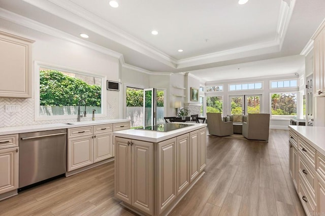 4470 Caminito Tecera, Del Mar, CA 92014 - kitchen featuring stainless steel dishwasher, black electric cooktop, open floor plan, a raised ceiling, and light countertops