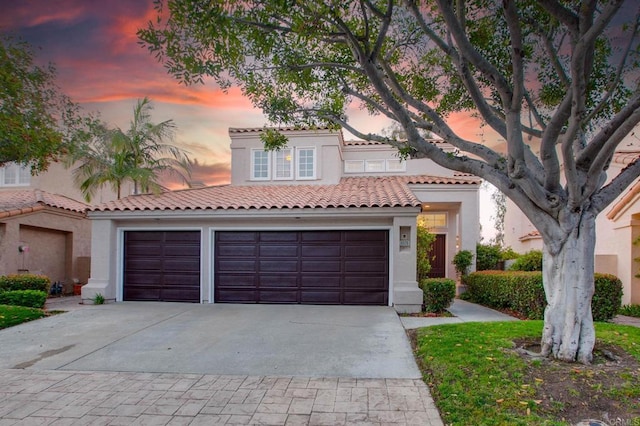 4470 Caminito Tecera, Del Mar, CA 92014 - mediterranean / spanish home featuring concrete driveway, stucco siding, a tile roof, and a garage