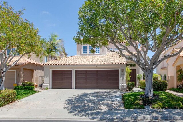 4470 Caminito Tecera, Del Mar, CA 92014 - view of front of home featuring stucco siding, a tile roof, driveway, and an attached garage