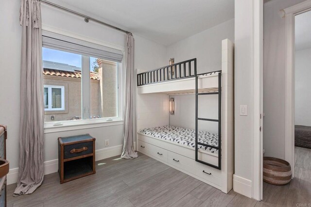 4470 Caminito Tecera, Del Mar, CA 92014 - bedroom with baseboards and wood finished floors