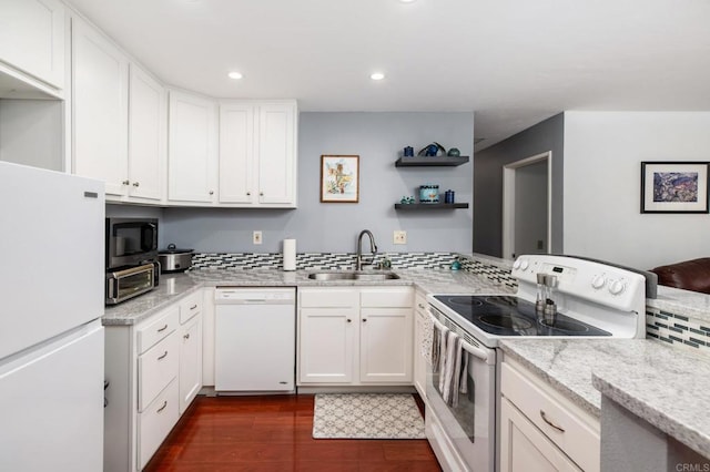 214 Woodland Pkwy Unit 206, San Marcos, CA 92069 - kitchen with white appliances, white cabinets, open shelves, light stone counters, and recessed lighting