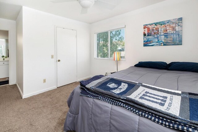 214 Woodland Pkwy Unit 206, San Marcos, CA 92069 - carpeted bedroom featuring baseboards and ceiling fan