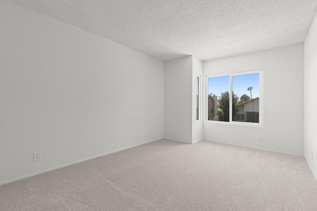 13443 Black Hills Rd, San Diego, CA 92129 - empty room featuring light colored carpet and a textured ceiling