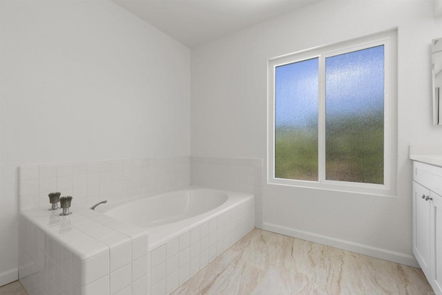 13443 Black Hills Rd, San Diego, CA 92129 - full bathroom featuring vanity, a bath, healthy amount of natural light, and marble finish floors