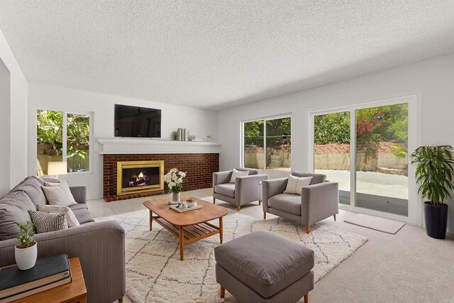13443 Black Hills Rd, San Diego, CA 92129 - living area featuring a textured ceiling, a brick fireplace, and light carpet