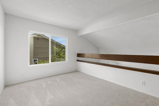 13443 Black Hills Rd, San Diego, CA 92129 - carpeted empty room featuring lofted ceiling and a textured ceiling