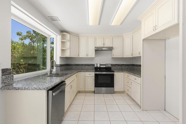 13443 Black Hills Rd, San Diego, CA 92129 - kitchen featuring stainless steel appliances, under cabinet range hood, open shelves, light tile patterned floors, and dark stone countertops