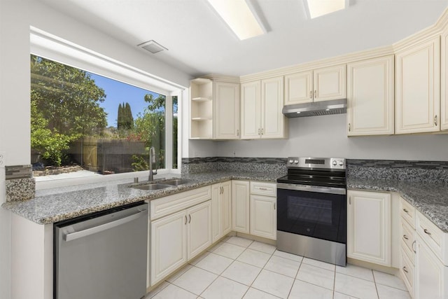 13443 Black Hills Rd, San Diego, CA 92129 - kitchen featuring stainless steel appliances, under cabinet range hood, cream cabinetry, and plenty of natural light