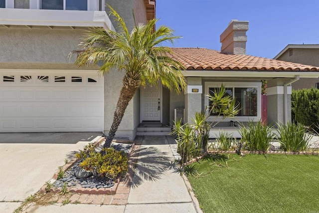 13443 Black Hills Rd, San Diego, CA 92129 - view of front of home featuring a tiled roof, a chimney, stucco siding, and a garage