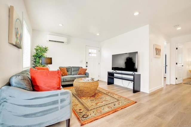 376378 Acacia Dr, Carlsbad, CA 92008 - living room with a wall unit AC, light wood-style floors, healthy amount of natural light, and recessed lighting