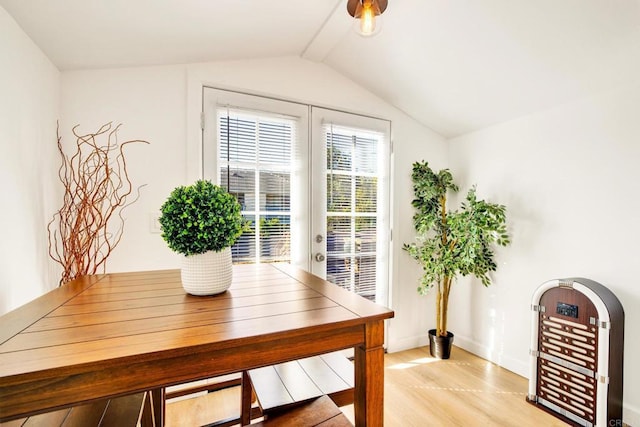 376378 Acacia Dr, Carlsbad, CA 92008 - dining room featuring light wood-style flooring, lofted ceiling, and french doors