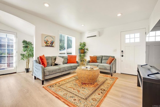 376378 Acacia Dr, Carlsbad, CA 92008 - living room with light wood-style floors, an AC wall unit, and recessed lighting