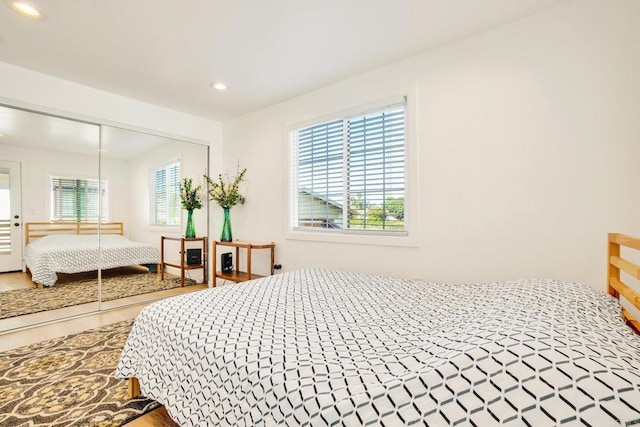 376378 Acacia Dr, Carlsbad, CA 92008 - bedroom with wood finished floors, recessed lighting, and a closet