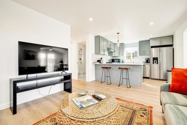 376378 Acacia Dr, Carlsbad, CA 92008 - living area featuring light wood-style flooring and recessed lighting