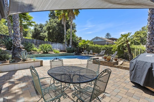 1001 Ontario St, Escondido, CA 92025 - fenced backyard with a grill, a patio area, and outdoor dining area