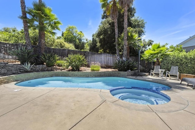 1001 Ontario St, Escondido, CA 92025 - view of swimming pool featuring a pool with connected hot tub, a patio area, and a fenced backyard