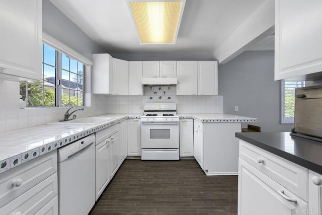 1001 Ontario St, Escondido, CA 92025 - kitchen with white appliances, under cabinet range hood, white cabinets, and healthy amount of natural light