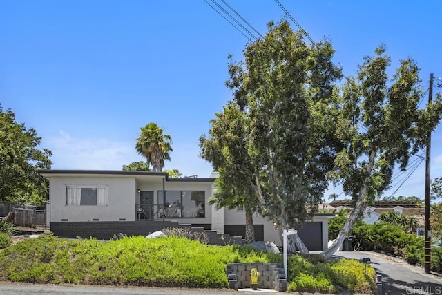 1001 Ontario St, Escondido, CA 92025 - view of front of home featuring an attached garage and stucco siding