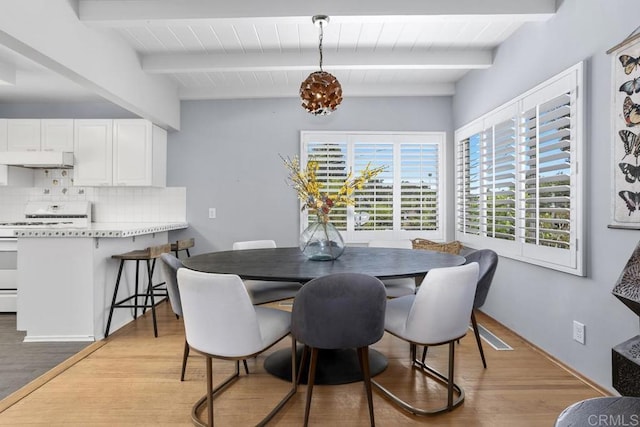 1001 Ontario St, Escondido, CA 92025 - dining area with beamed ceiling and light wood-style floors