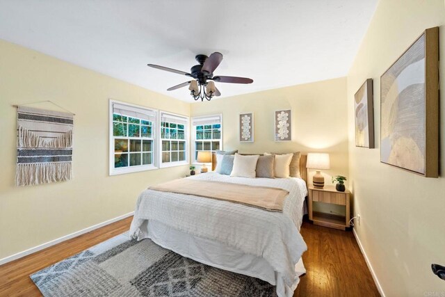 4920 Elsa Rd, San Diego, CA 92120 - bedroom featuring wood finished floors and a ceiling fan