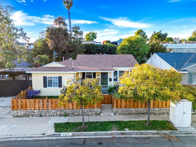 4920 Elsa Rd, San Diego, CA 92120 - ranch-style home featuring a fenced front yard and stucco siding