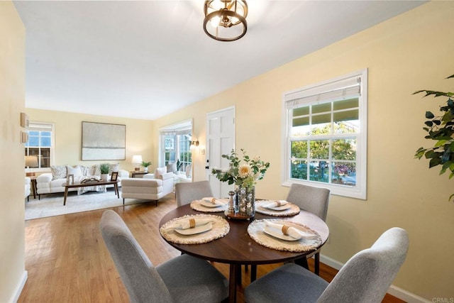 4920 Elsa Rd, San Diego, CA 92120 - dining room featuring plenty of natural light and wood finished floors