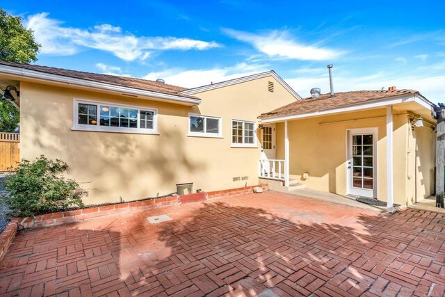 4920 Elsa Rd, San Diego, CA 92120 - rear view of property featuring a patio and stucco siding