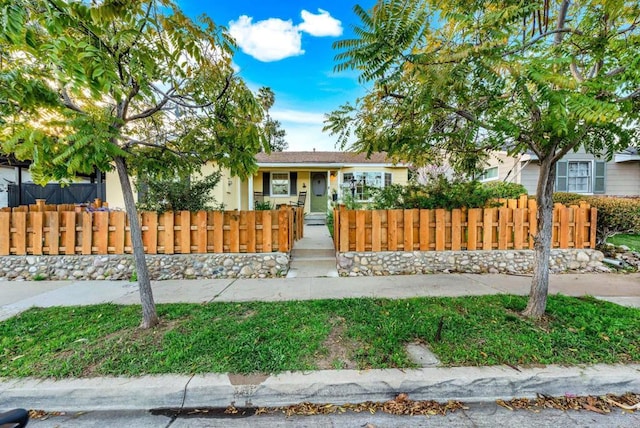 4920 Elsa Rd, San Diego, CA 92120 - view of front facade with a fenced front yard and stucco siding