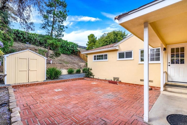 4920 Elsa Rd, San Diego, CA 92120 - view of patio featuring a shed