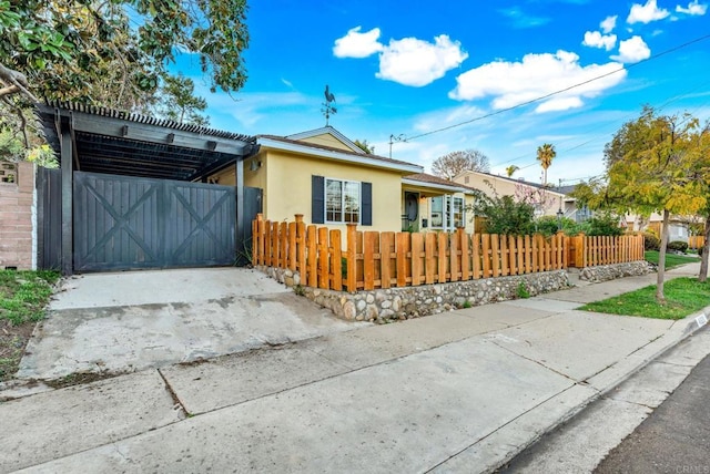 4920 Elsa Rd, San Diego, CA 92120 - view of front of house with stucco siding and a fenced front yard