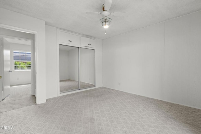 929 Diamond St, Monrovia, CA 91016 - unfurnished bedroom with light colored carpet, a ceiling fan, and a closet